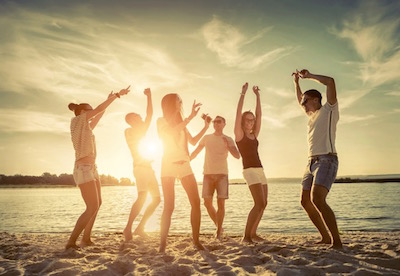 party-on-beach-at-sunset