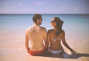 couple-on-beach-talking